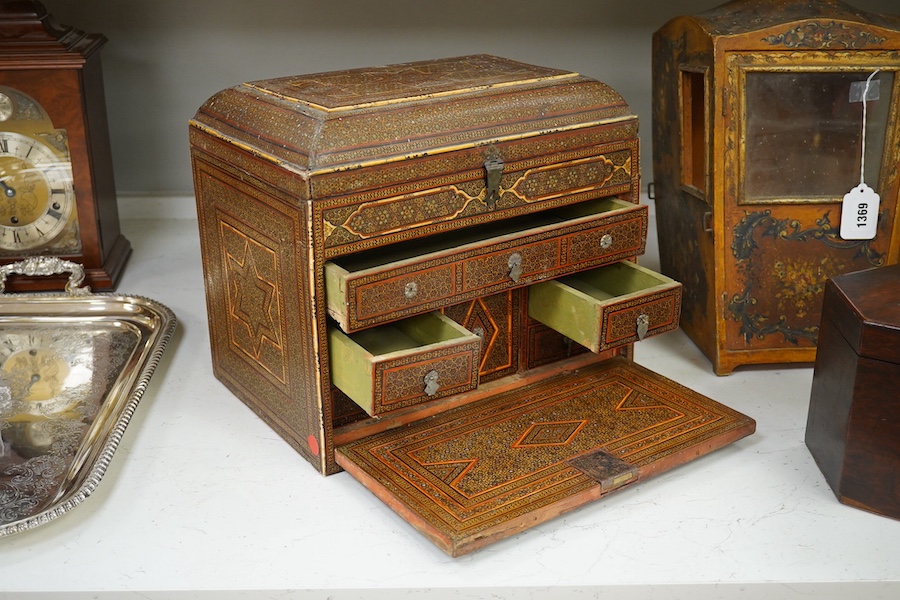 A 19th century Shiraz Eastern inlaid table cabinet, 36cm wide, 32cm high. Condition - damage to front corner edge of stringing, one side has small crack and top stringing one side missing.